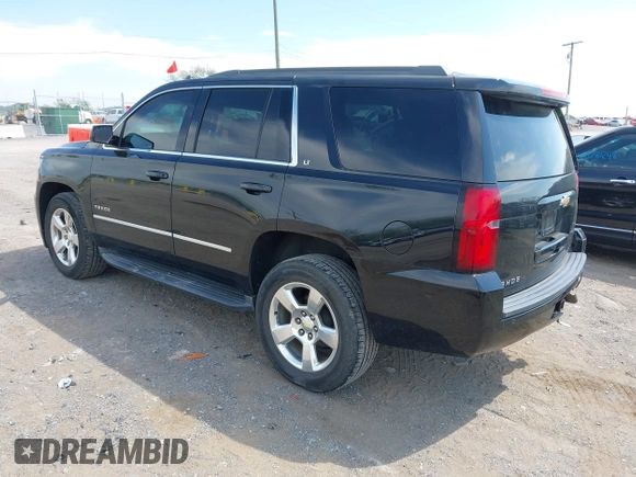 2015 Chevrolet Tahoe LT with VIN 1GNSCBKC9FR679748, listed as a IAAI auction lot 42018017 with 224,264 mi miles and . Bid and sale history available at DreamBid. Image 3.