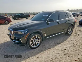 2023 BMW X5 xDrive40i with VIN 5UXCR6C0XP9R88295, listed as a Copart auction lot 61864215 with 23,764 mi miles and Salvage title. Bid and sale history available at DreamBid. Image 1.