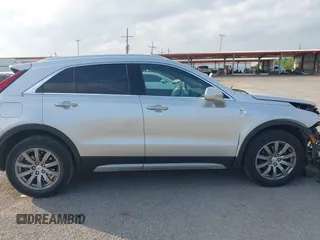 2019 Cadillac XT4 FWD Premium Luxury with VIN 1GYFZCR42KF228986, listed as a IAAI auction lot 42019157 with 79,397 mi miles and . Bid and sale history available at DreamBid. Image 13.