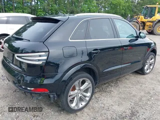 2015 Audi Q3 Prestige with VIN WA1GFCFSXFR012761, listed as a IAAI auction lot 42181745 with 148,133 mi miles and . Bid and sale history available at DreamBid. Image 4.