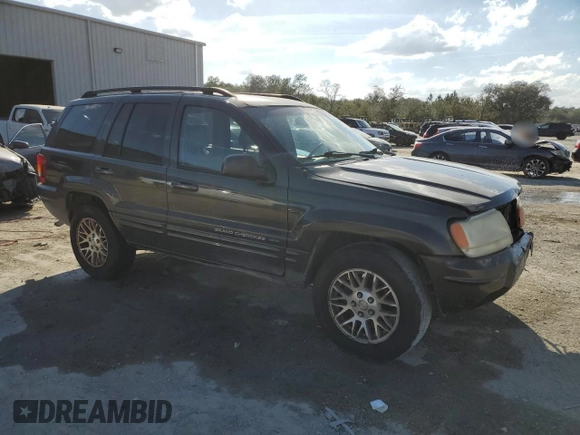 2004 Jeep Grand Cherokee Limited with VIN 1J4GW58S24C374012, listed as a Copart auction lot 44896325 with 153,978 mi miles and Salvage title. Bid and sale history available at DreamBid. Image 4.