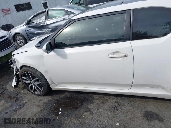2014 Scion tC z VIN JTKJF5C77E3082073, wystawiony jako IAAI lot #42107615 z przebiegiem 223 895 mil mil oraz . Historia ofert i sprzedaży dostępna na DreamBid. Obrazek 14.