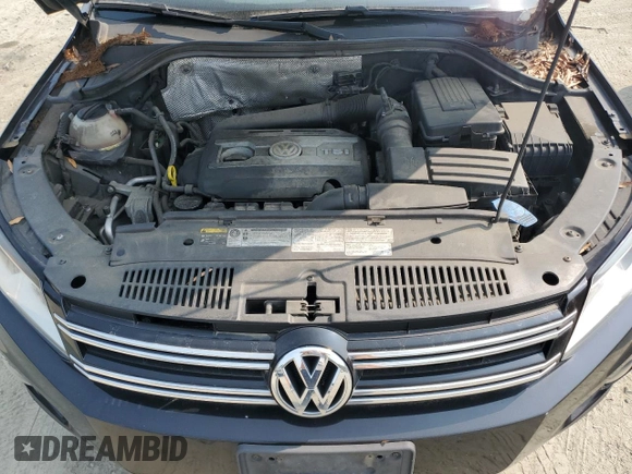 2015 Volkswagen Tiguan S z VIN WVGBV7AX8FW522441, wystawiony jako Copart lot #59278655 z przebiegiem 115 123 mil mil oraz Czysty tytuł • Clean title. Historia ofert i sprzedaży dostępna na DreamBid. Obrazek 12.
