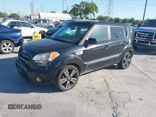 2011 Kia Soul + with VIN KNDJT2A22B7282062, listed as a IAAI auction lot 42035564 with 201,870 mi miles. Bid and sale history available at carsss.com. Image 2.