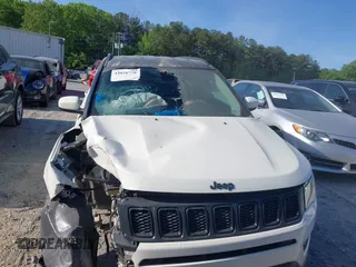 2021 Jeep Compass Altitude with VIN 3C4NJDBB2MT596181, listed as a IAAI auction lot 42026716 with 69,526 mi miles and . Bid and sale history available at DreamBid. Image 12.