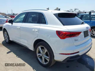 2019 Audi Q3 S line Premium z VIN WA1DECF39K1079763, wystawiony jako IAAI lot #42160517 z przebiegiem 66 924 mil mil oraz . Historia ofert i sprzedaży dostępna na DreamBid. Obrazek 3.