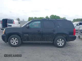 2014 GMC Yukon SLT with VIN 1GKS2CE03ER248683, listed as a IAAI auction lot 41904412 with 147,156 mi miles and . Bid and sale history available at DreamBid. Image 14.
