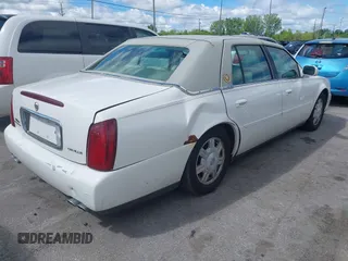 2003 Cadillac DeVille z VIN 1G6KD54Y23U221187, wystawiony jako IAAI lot #42339315 z przebiegiem 82 681 mil mil oraz . Historia ofert i sprzedaży dostępna na DreamBid. Obrazek 4.