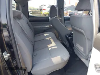 2013 Toyota Tacoma with VIN 3TMMU4FNXDM057020, listed as a IAAI auction lot 42560987 with 177,333 mi miles and . Bid and sale history available at DreamBid. Image 8.