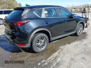2017 Mazda CX-5 Sport with VIN JM3KFABL5H0141895, listed as a IAAI auction lot 41718108 with 69,312 mi miles. Bid and sale history available at carsss.com. Image 4.