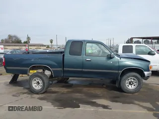 1996 Toyota T100 SR5 z VIN JT4UN24D7T0029477, wystawiony jako IAAI lot #41484412 z przebiegiem 260 843 mil mil oraz . Historia ofert i sprzedaży dostępna na DreamBid. Obrazek 14.
