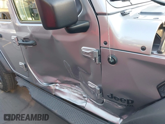 2021 Jeep Wrangler Unlimited Sport Altitude with VIN 1C4HJXDGXMW662493, listed as a IAAI auction lot 41288957 with 64,808 mi miles and . Bid and sale history available at DreamBid. Image 6.