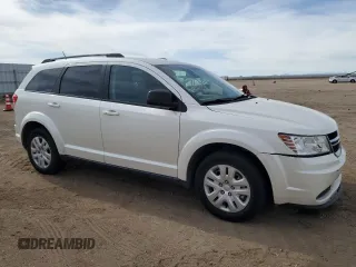 2017 Dodge Journey SE with VIN 3C4PDCAB2HT675948, listed as a Copart auction lot 54778875 with 84,544 mi miles and Salvage Title. Bid and sale history available at DreamBid. Image 4.