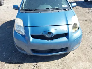 2010 Toyota Yaris with VIN JTDKT4K3XA5282294, listed as a IAAI auction lot 41856423 with 264,409 mi miles. Bid and sale history available at carsss.com. Image 6.