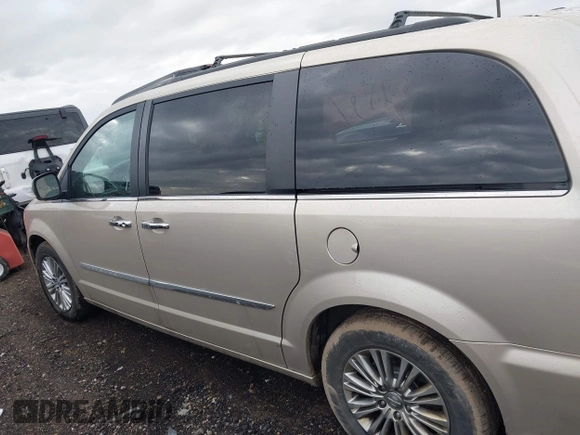 2016 Chrysler Town & Country Touring z VIN 2C4RC1CG5GR166771, wystawiony jako IAAI lot #41715807 z przebiegiem 121 652 mil mil oraz . Historia ofert i sprzedaży dostępna na DreamBid. Obrazek 14.