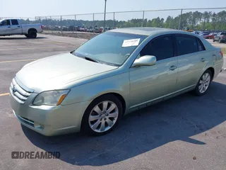 2007 Toyota Avalon XL with VIN 4T1BK36B67U252394, listed as a IAAI auction lot 41978589 with 256,359 mi miles. Bid and sale history available at carsss.com. Image 2.