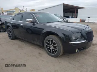 2006 Chrysler 300 C with VIN 2C3LK63H76H284053, listed as a IAAI auction lot 41711269 with 142,901 mi miles. Bid and sale history available at carsss.com. Image 1.