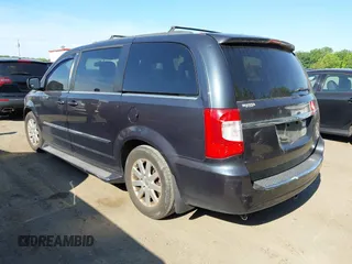 2014 Chrysler Town & Country Touring with VIN 2C4RC1BG2ER124461, listed as a IAAI auction lot 42181413 with 181,360 mi miles and . Bid and sale history available at DreamBid. Image 3.