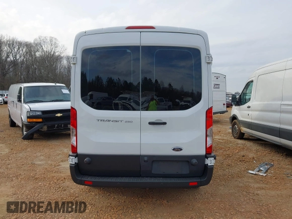 2016 Ford Transit Cargo z VIN 1FTYR2CGXGKA82105, wystawiony jako IAAI lot #41544955 z przebiegiem 129 642 mil mil oraz . Historia ofert i sprzedaży dostępna na DreamBid. Obrazek 16.