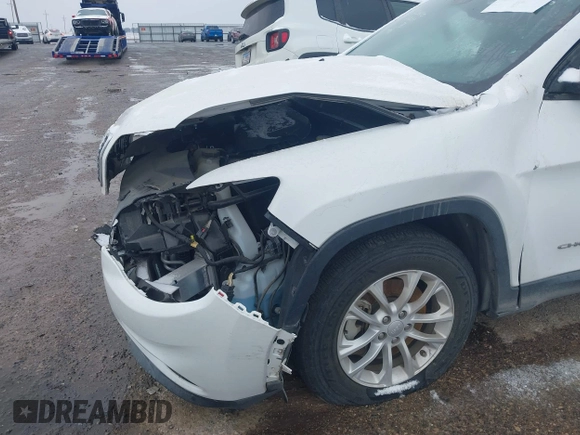 2021 Jeep Cherokee Latitude z VIN 1C4PJMCB8MD125181, wystawiony jako IAAI lot #41273576 z przebiegiem 47 550 mil mil oraz . Historia ofert i sprzedaży dostępna na DreamBid. Obrazek 6.