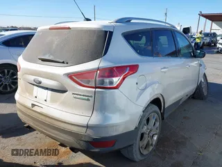 2016 Ford Escape Titanium with VIN 1FMCU0J96GUB36680, listed as a IAAI auction lot 41446705 with 137,926 mi miles. Bid and sale history available at carsss.com. Image 4.