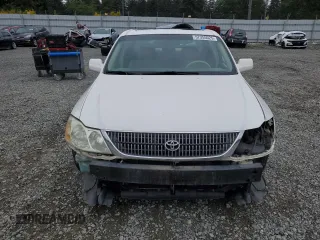 2001 Toyota Avalon XL z VIN 4T1BF28B31U136069, wystawiony jako Copart lot #57355025 z przebiegiem 217 489 mil mil oraz Szkody całkowita. Historia ofert i sprzedaży dostępna na DreamBid. Obrazek 5.