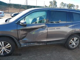 2017 Honda Pilot EX-L with VIN 5FNYF6H59HB101815, listed as a IAAI auction lot 41704661 with 130,479 mi miles and . Bid and sale history available at DreamBid. Image 14.