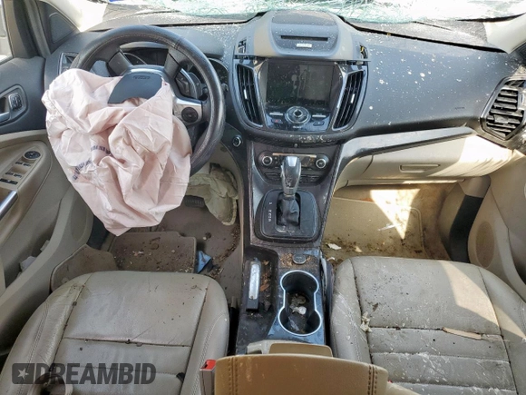 2016 Ford Escape Titanium с VIN 1FMCU9J97GUB28172, выставлен на аукционе Copart как лот 59658095 с пробегом Не указан миль и Списание • Salvage title. История ставок и продаж доступна на DreamBid. Изображение 8.