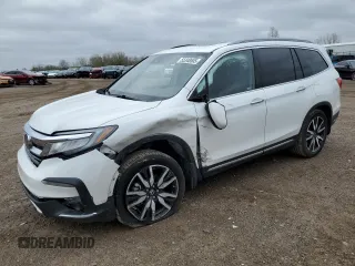 2021 Honda Pilot Elite z VIN 5FNYF6H00MB067617, wystawiony jako Copart lot #55348505 z przebiegiem 141 130 mil mil oraz Czysty tytuł • Clean title. Historia ofert i sprzedaży dostępna na DreamBid. Obrazek 1.