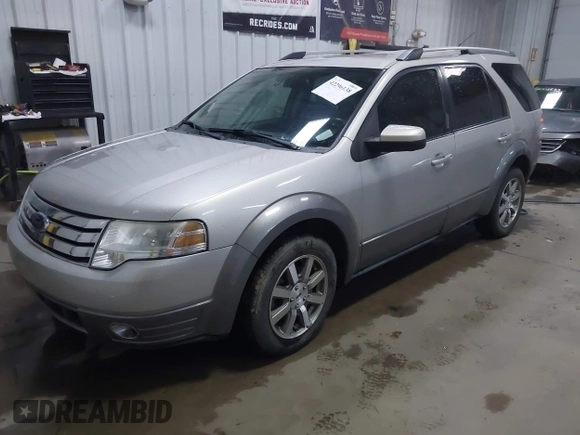 2008 Ford Taurus X SEL with VIN 1FMDK02W88GA12389, listed as a IAAI auction lot 42296138 with 127,484 mi miles and . Bid and sale history available at DreamBid. Image 2.
