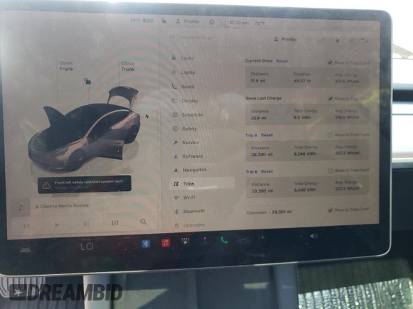 2023 Tesla Model 3 with VIN 5YJ3E1EA1PF664941, listed as a Copart auction lot 58097005 with 39,391 mi miles and Salvage title. Bid and sale history available at DreamBid. Image 9.