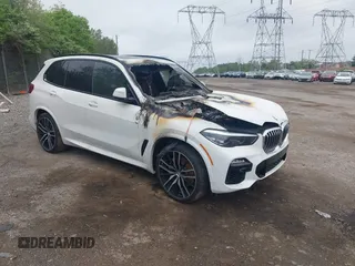 2019 BMW X5 xDrive50i z VIN 5UXJU2C5XKLN64637, wystawiony jako IAAI lot #42182077 z przebiegiem Nie podano mil oraz . Historia ofert i sprzedaży dostępna na DreamBid. Obrazek 1.