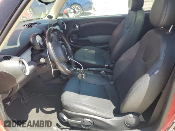 2011 MINI Hardtop with VIN WMWSU3C57BT251442, listed as a Copart auction lot 56894615 with 112,308 mi miles and Clean title. Bid and sale history available at DreamBid. Image 7.