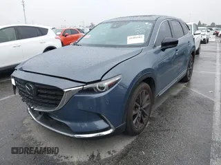 2023 Mazda CX-9 Carbon Edition with VIN JM3TCBDY5P0636916, listed as a IAAI auction lot 41804582 with 29,338 mi miles and . Bid and sale history available at carsss.com. Image 2.