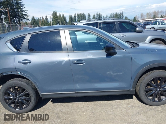 2023 Mazda CX-5 2.5 S Carbon Edition with VIN JM3KFBCM8P0134757, listed as a IAAI auction lot 41893648 with 9,587 mi miles. Bid and sale history available at carsss.com. Image 14.