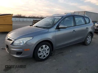2011 Hyundai Elantra Touring SE with VIN KMHDC8AE3BU097767, listed as a Copart auction lot 86900924 with 115,482 mi miles and Salvage Title. Bid and sale history available at carsss.com. Image 1.