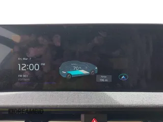 2022 Kia EV6 Wind z VIN KNDC3DLC6N5089018, wystawiony jako IAAI lot #41748175 z przebiegiem 25 157 mil mil oraz . Historia ofert i sprzedaży dostępna na DreamBid. Obrazek 18.