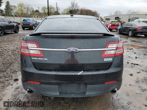 2015 Ford Taurus SHO z VIN 1FAHP2KT2FG182307, wystawiony jako Copart lot #52596525 z przebiegiem 68 214 mil mil oraz Szkoda całkowita • Salvage title. Historia ofert i sprzedaży dostępna na DreamBid. Obrazek 6.