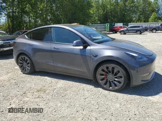 2022 Tesla Model Y Performance with VIN 7SAYGDEF3NF384161, listed as a Copart auction lot 59989145 with 12,731 mi miles and Salvage title. Bid and sale history available at DreamBid. Image 4.