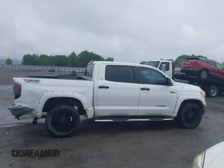 2015 Toyota Tundra SR5 z VIN 5TFDW5F16FX430242, wystawiony jako IAAI lot #42112604 z przebiegiem 179 682 mil mil oraz . Historia ofert i sprzedaży dostępna na DreamBid. Obrazek 13.