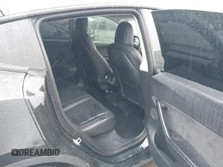 2022 Tesla Model Y Performance z VIN 7SAYGDEF7NF457757, wystawiony jako IAAI lot #42263449 z przebiegiem 65 747 mil mil oraz . Historia ofert i sprzedaży dostępna na DreamBid. Obrazek 8.