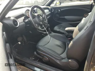 2012 MINI Coupe z VIN WMWSX1C57CT163911, wystawiony jako Copart lot #65001404 z przebiegiem 101 939 mil mil oraz Szkody całkowita. Historia ofert i sprzedaży dostępna na DreamBid. Obrazek 8.