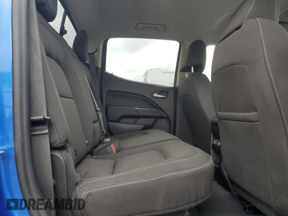 2019 GMC Canyon 4WD SLE z VIN 1GTG6CEN1K1206640, wystawiony jako Copart lot #55339285 z przebiegiem 52 166 mil mil oraz Szkody całkowita. Historia ofert i sprzedaży dostępna na DreamBid. Obrazek 10.
