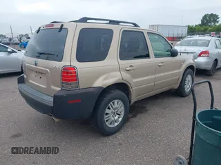 2007 Mercury Mariner Luxury with VIN 4M2YU91187KJ14159, listed as a IAAI auction lot 42576802 with 166,027 mi miles and . Bid and sale history available at DreamBid. Image 4.