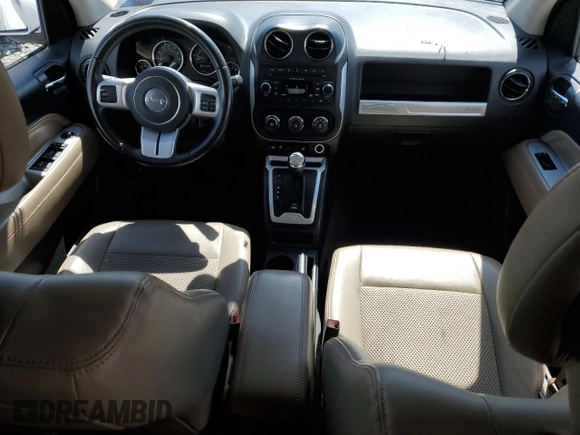 2016 Jeep Compass High Altitude Edition with VIN 1C4NJCEA7GD789837, listed as a Copart auction lot 52000505 with 96,396 mi miles and Salvage Title. Bid and sale history available at carsss.com. Image 8.