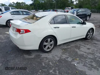2009 Acura TSX with VIN JH4CU26649C018276, listed as a IAAI auction lot 42469738 with 130,961 mi miles and . Bid and sale history available at DreamBid. Image 4.