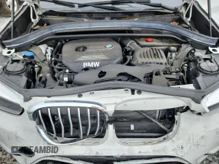 2018 BMW X1 xDrive28i z VIN WBXHT3C36J5L24918, wystawiony jako Copart lot #62171365 z przebiegiem 23 446 mil mil oraz Szkoda całkowita • Salvage title. Historia ofert i sprzedaży dostępna na DreamBid. Obrazek 12.