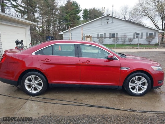 2014 Ford Taurus SEL with VIN 1FAHP2E87EG121203, listed as a IAAI auction lot 41908069 with 140,451 mi miles. Bid and sale history available at carsss.com. Image 13.