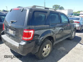 2011 Ford Escape XLT with VIN 1FMCU0D7XBKA54899, listed as a IAAI auction lot 42035816 with 180,770 mi miles. Bid and sale history available at carsss.com. Image 4.