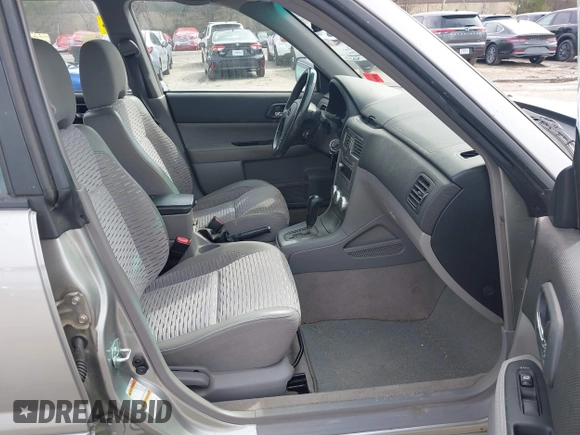 2005 Subaru Forester XS with VIN JF1SG65695H735272, listed as a IAAI auction lot 41949103 with 105,780 mi miles and . Bid and sale history available at DreamBid. Image 5.